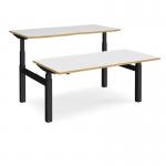 Elev8 Touch sit-stand back-to-back desks 1600mm x 1650mm - black frame, white top with oak edge EVTB-1600-K-WO