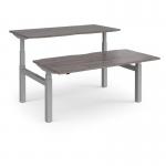 Elev8 Touch sit-stand back-to-back desks 1600mm x 1650mm - silver frame and grey oak top
