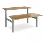 Elev8 Touch sit-stand back-to-back desks 1600mm x 1650mm - silver frame, oak top EVTB-1600-S-O