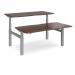 Elev8 Touch sit-stand back-to-back desks 1600mm x 1650mm - silver frame, walnut top EVTB-1600-S-W