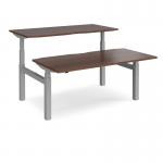 Elev8 Touch sit-stand back-to-back desks 1600mm x 1650mm - silver frame, walnut top EVTB-1600-S-W