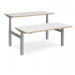 Elev8 Touch sit-stand back-to-back desks 1600mm x 1650mm - silver frame, white top with oak edge EVTB-1600-S-WO