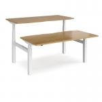 Elev8 Touch sit-stand back-to-back desks 1600mm x 1650mm - white frame, oak top EVTB-1600-WH-O