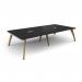 In the image, you can see the stunning Dams Boardroom and Conference Tables Fuze rectangular boardroom table. It measures 3200mm x 1600mm and features two cutouts (272mm x 132mm) for added convenience. The table boasts sleek oak legs, contrasting with a white underframe and black top for a modern and professional look.