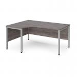 Maestro 25 left hand ergonomic desk 1600mm wide - silver bench leg frame and grey oak top