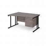 Maestro 25 left hand wave desk 1400mm wide with 2 drawer pedestal - black cantilever leg frame, grey oak top MC14WLP2KGO