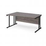 Maestro 25 left hand wave desk 1600mm wide - black cantilever leg frame, grey oak top MC16WLKGO