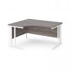 Maestro 25 left hand ergonomic desk 1400mm wide - white cable managed leg frame and grey oak top