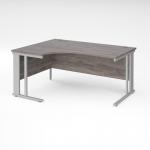 Maestro 25 left hand ergonomic desk 1600mm wide - silver cable managed leg frame and grey oak top