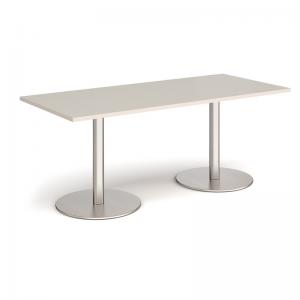 Monza rectangular dining table with flat round brushed steel bases