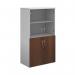 The Dams Cupboards Duo combination unit features glass upper doors and walnut lower doors. It stands at 1440mm high and has 3 shelves. The unit is white with a sleek, modern design.
