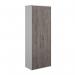 In the photo, you can see two tall cupboards with double doors, standing at a height of 2140mm. The cupboards are white with grey oak doors and each have 5 shelves inside. They have a sleek and modern design, adding a touch of elegance to any space.