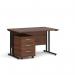 This photograph shows a sleek and modern Dams Pedestal Desk Maestro 25 straight desk, measuring 1200mm x 800mm. The desk features a black cantilever frame and is accompanied by a 3 drawer pedestal. The desk has a beautiful walnut finish, making it a stylish addition to any workspace.