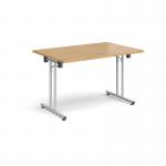 Rectangular folding leg table with silver legs and straight foot rails 1200mm x 800mm - oak
