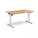 Rectangular folding leg table with silver legs and straight foot rails 1400mm x 800mm - oak