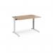 This picture shows a modern and versatile workspace with a white frame and beech top. The straight desk measures 1200mm x 800mm and features adjustable heights for both sitting and standing. Perfect for various work styles and settings.