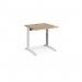 This picture features a spacious 800mm x 800mm straight desk with a white frame and a beech top. It can be adjusted to different heights, making it versatile for sitting or standing positions.