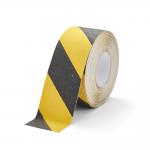 The image shows a roll of durable floor marking tape, with a width of 75mm and length of 15m. The tape is orange with black hazard warning markings and has a strong anti-slip grip. The brand name DURALINE GRIP is printed on the tape.