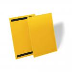 The photo shows a stack of 50 durable magnetic ticket label holders in bright yellow, designed for use with A4 documents. The document pockets are perfect for organizing and labeling items in a busy warehouse, with easy-to-read signage for increased efficiency.