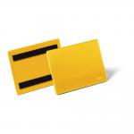 This photo shows a stack of 50 durable magnetic ticket label holders and document pockets in a bright yellow color. The label holders are specifically designed for A6 sized documents and are meant to be used in a warehouse setting for clear and long-lasting signage.