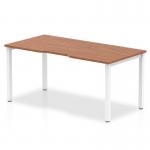 This image shows a sleek and modern Evolve Plus 1600mm Single Starter Bench Desk with a walnut top and a white frame. The dynamic design allows for versatile use in any office setting.