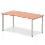 This image shows a sleek, modern bench desk with a 1400mm single starter design. The desk features a stylish beech top and a silver frame, giving it a professional and contemporary look. Perfect for any office space in need of a dynamic and functional work station.