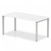 This picture features a stylish white top office bench desk with a silver frame. The sleek design and dynamic bench desking of this desk makes it perfect for a modern office space.