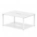 This photograph features a spacious, white top bench desk with a sleek, white frame. Perfect for a dynamic and collaborative workspace, it comfortably accommodates two people. Experience the modern and functional design of the Evolve Plus 1200mm B2B 2 Person office bench desk in this image.