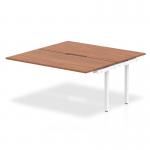 The Dynamic Bench Desking Evolve Plus 1600mm B2B Office Bench Desk Ext Kit features a sleek and modern design with a walnut top and white frame. The spacious 1600mm desk provides ample workspace, while the dynamic design allows for versatility and collaboration.