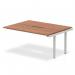 The Dynamic Bench Desking Evolve Plus 1400mm desk set features a sleek white frame and a warm walnut top, perfect for modernizing any office space. This versatile bench desk extender adds style and function with its dynamic design.