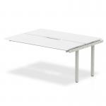 The picture showcases a sleek and modern dynamic bench desk, the Evolve Plus 1200mm B2B. It features a crisp white top and a silver frame, creating a clean and professional look. This office bench desk ext kit is ideal for any workspace, providing functionality and style.
