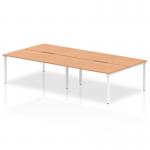 This image features a modern and sleek Dynamic Bench Desking Evolve Plus 1600mm B2B 4 Person Office Bench Desk. The desk has a beautiful Oak top and a clean white frame, making it a perfect addition to any contemporary office space.
