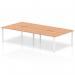 This image features a modern and sleek Dynamic Bench Desking Evolve Plus 1600mm B2B 4 Person Office Bench Desk. The desk has a beautiful Oak top and a clean white frame, making it a perfect addition to any contemporary office space.