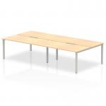 A vibrant and modern workplace setup, this photograph features the Dynamic Bench Desking Evolve Plus 1600mm B2B 4 Person Office Bench Desk. With a sleek maple top and silver frame, the desk offers ample space for a dynamic and collaborative working environment.