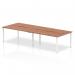 This photo shows a modern and sleek Dynamic Bench Desking Evolve Plus desk. It features a 1400mm walnut top and a silver frame, providing a clean and sophisticated look. This desk is designed for 4 people to comfortably work together in a professional office setting.
