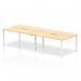 The picture shows a modern and sleek office setup with four people working on 1400mm maple top benches. The silver frames add a touch of elegance to the dynamic bench desking setup.