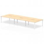 This photo features a sleek and modern Dynamic Bench Desking Evolve Plus 1600mm B2B 6 Person Office Bench Desk. The desk has a stylish Maple top and a clean White frame, creating a professional and inviting space for work.