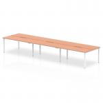 In the photograph, the Dynamic Bench Desking Evolve Plus 1200mm B2B 6 Person Office Bench Desk is seen with a stylish beech top and white frame. The desk can accommodate 6 people and is perfect for a modern office setting.