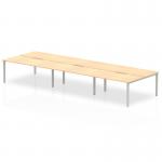 This image features a spacious 1600mm bench desk with a sleek maple top and silver frame. Designed for efficiency and collaboration, it comfortably accommodates six people and adds a modern touch to any office space. The dynamic bench desking system promotes productivity and flexibility.