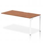 The Dynamic Bench Desking Evolve Plus features a sleek and modern design with its 1600mm single row office bench desk. Its walnut top and white frame add a touch of sophistication to any workspace. The kit includes everything needed for easy assembly.