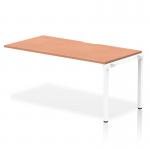 A sleek and modern office space with the Dynamic Bench Desking Evolve Plus 1600mm Single Row Office Bench Desk Ext Kit. The desk features a stylish beech top paired with a white frame, offering a sophisticated and functional workstation for any professional setting.