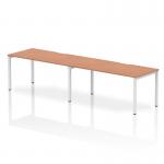 The Dynamic Bench Desking Evolve Plus 1600mm Single Row 2 Person Office Bench Desk features a sleek beech top and a modern white frame. With seating for two, this desk is perfect for collaboration and maximizing workspace. Its versatile design allows for easy customization and a dynamic work environment.