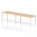 This photo features a modern and versatile Dynamic Bench Desking Evolve Plus 1600mm Single Row 2 Person Office Bench Desk. The desk has a sleek maple top and a white frame, offering a clean and contemporary look. Perfect for a collaborative work environment.