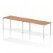 A sleek and modern office desk, the Dynamic Bench Desking Evolve Plus features a 1600mm single row designed for 2 individuals. The desk has an oak top and a white frame, giving it a clean and professional look.