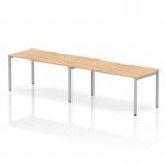 This image features the Dynamic Bench Desking Evolve Plus 1600mm Single Row, a 2-person office desk with a maple top and silver frame. The modern design and clean lines create a sleek and functional workspace, perfect for any office setting. The spacious desk allows for plenty of room to work, while the silver frame adds a touch of elegance.