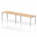 This image features the Dynamic Bench Desking Evolve Plus 1600mm Single Row, a 2-person office desk with a maple top and silver frame. The modern design and clean lines create a sleek and functional workspace, perfect for any office setting. The spacious desk allows for plenty of room to work, while the silver frame adds a touch of elegance.