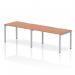 This image captures a modern and functional work environment with the Dynamic Bench Desking Evolve Plus 1400mm Single Row 2 Person Office Bench Desk. The sleek, beech top and silver frame convey a professional and efficient space for two people to work comfortably.