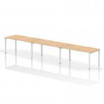 This image shows a sleek and modern office bench desk with a maple top and white frame. It features a 1600mm single row design and can accommodate three people. Its dynamic bench desking is perfect for a contemporary and efficient workspace.