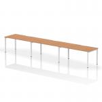 The Dynamic Bench Desking Evolve Plus is a modern and sleek 1600mm single row bench desk. The oak top contrasts beautifully with the white frame, creating a clean and professional look. This desk can comfortably accommodate three people, making it a great option for collaborative workspaces.