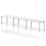 This photo features the Dynamic Bench Desking Evolve Plus 1400mm Single Row 3 Person Office Bench Desk. It has a sleek white top and a modern silver frame, creating a clean and contemporary look. This desk is designed for collaborative work, with enough space for three people in one row.